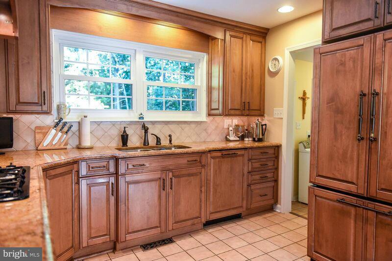 3511 Sixes Road Prince Frederick, MD 20678 - Photo 8 of 29 a kitchen with stainless steel appliances granite countertop a refrigerator and a sink