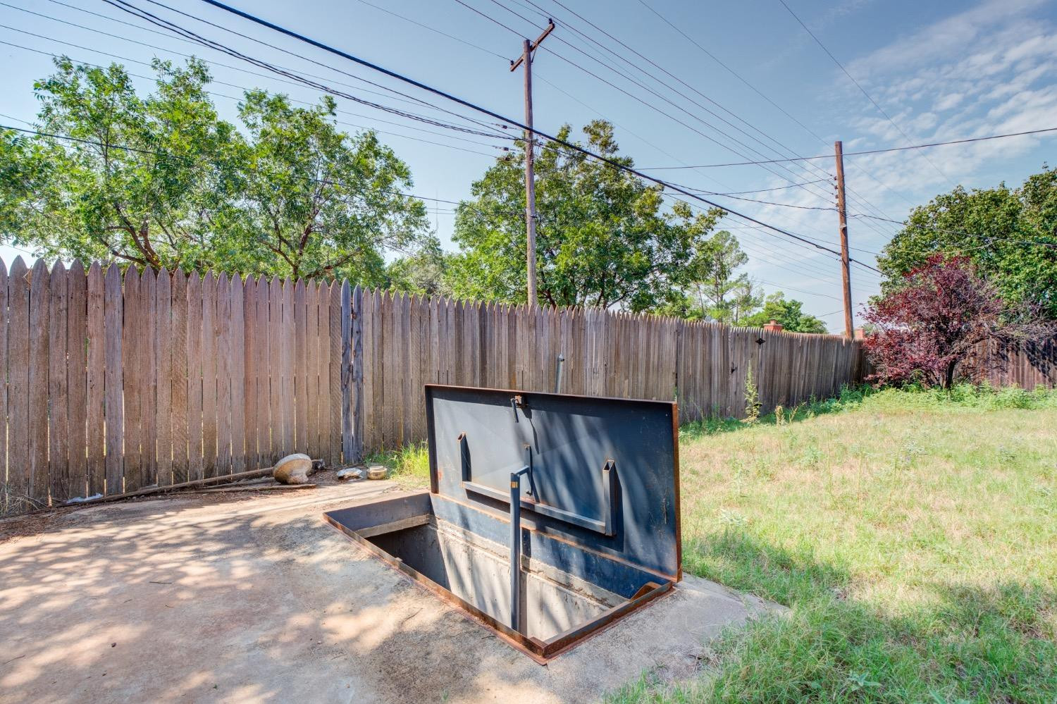 2119 67th Street Lubbock, TX 79412 - Photo 41 of 42 a backyard of a house