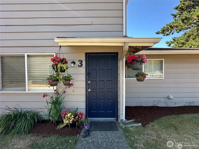 a front view of a house with a garage