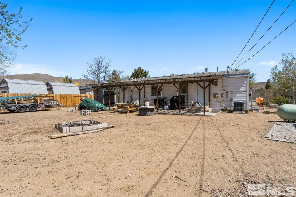 3867 Puffin Street Reno, NV 89508 - Photo 27 of 29 a view of a swimming pool with a lounge chair