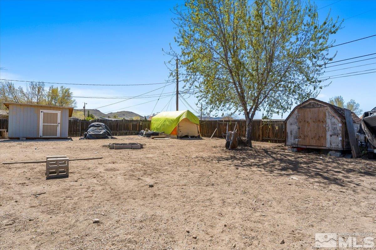 3867 Puffin Street Reno, NV 89508 - Photo 29 of 29 a view of backyard with wooden fence