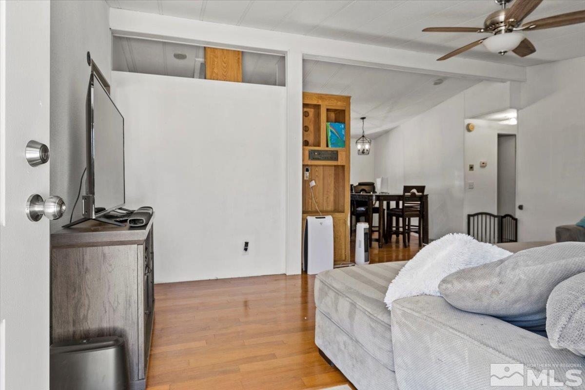 3867 Puffin Street Reno, NV 89508 - Photo 5 of 29 a living room with furniture and a table