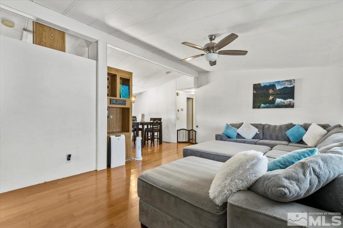 3867 Puffin Street Reno, NV 89508 - Photo 6 of 29 a living room with furniture and a ceiling fan