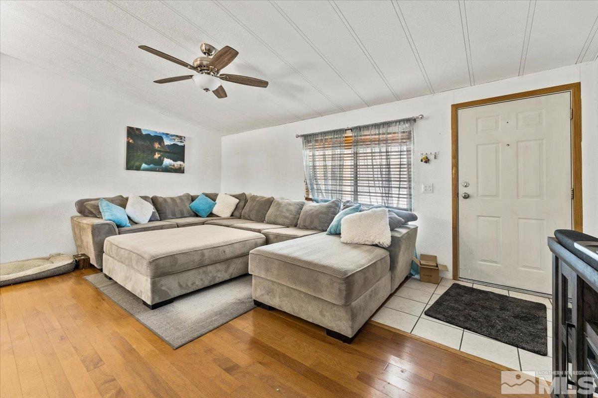 3867 Puffin Street Reno, NV 89508 - Photo 7 of 29 a spacious bedroom with a bed and a window