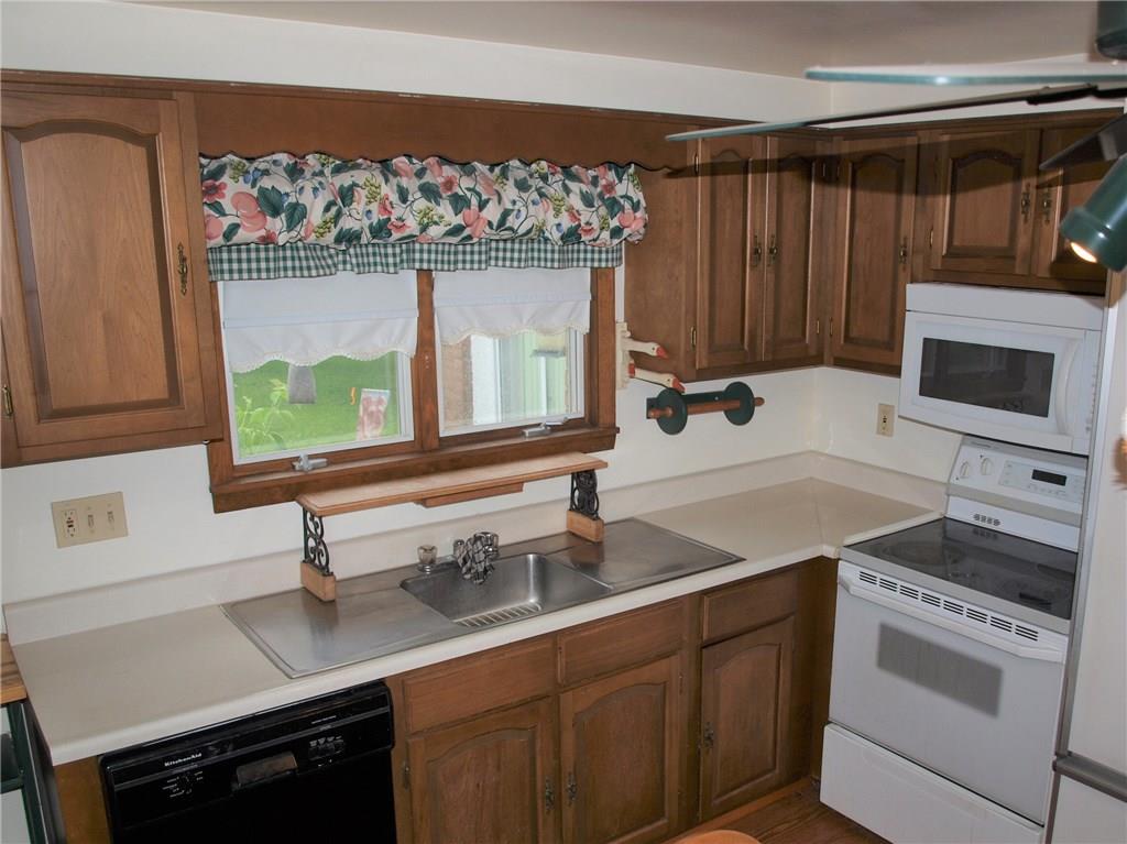 1019 Blackridge Road Pittsburgh, PA 15235 - Photo 4 of 21 Kitchen overlooks the back yard. Nicely sized and all appliances stay.