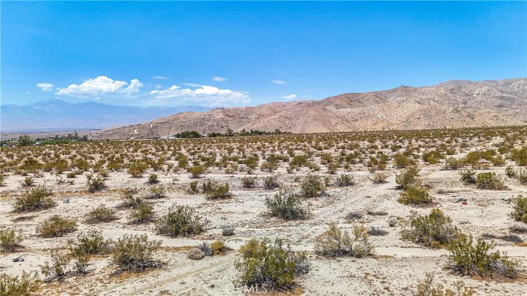 60 Dillon Road Desert Hot Springs, CA 92241 - Photo 17 of 35 a view of a city with mountains in the background