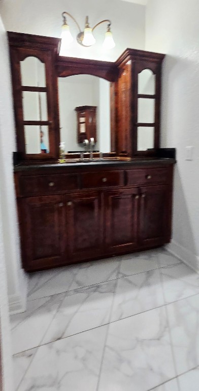 14830 Croxton Drive Houston, TX 77015 - Photo 15 of 38 a bathroom with a sink and a large mirror