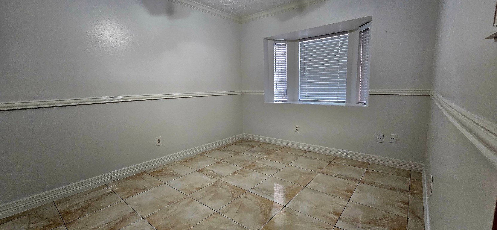 14830 Croxton Drive Houston, TX 77015 - Photo 21 of 38 a view of a room that has a window in it