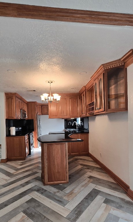 14830 Croxton Drive Houston, TX 77015 - Photo 8 of 38 a kitchen with stainless steel appliances granite countertop a stove and a wooden cabinets