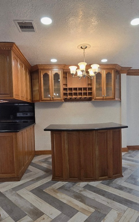 14830 Croxton Drive Houston, TX 77015 - Photo 9 of 38 a kitchen with a refrigerator and a stove