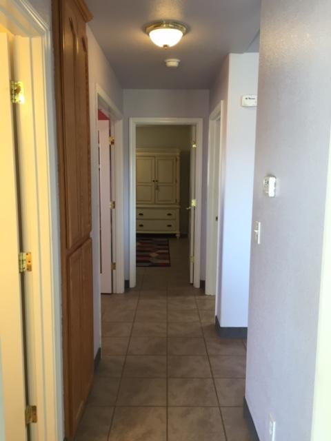 21215 Gyle Road Corning, CA 96021 - Photo 22 of 75 a view of a hallway to rooms