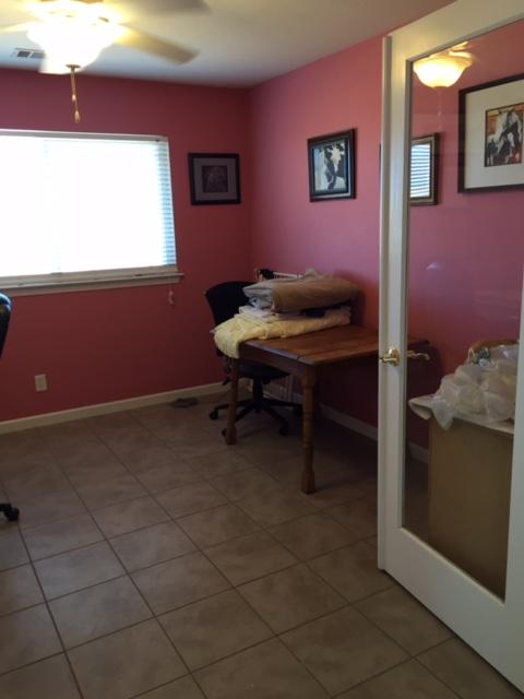 21215 Gyle Road Corning, CA 96021 - Photo 24 of 75 a room with furniture and a window