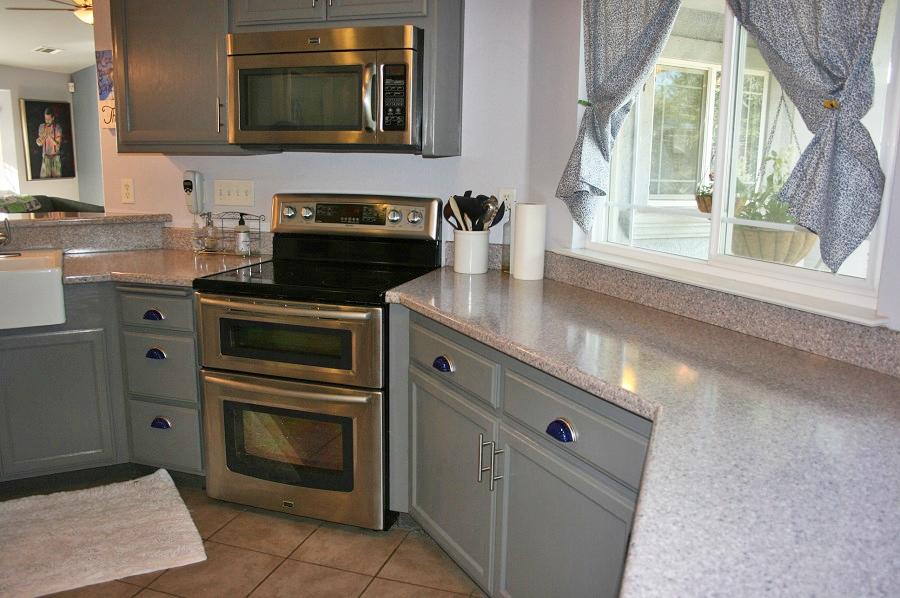 21215 Gyle Road Corning, CA 96021 - Photo 29 of 75 a kitchen with a stove microwave and sink
