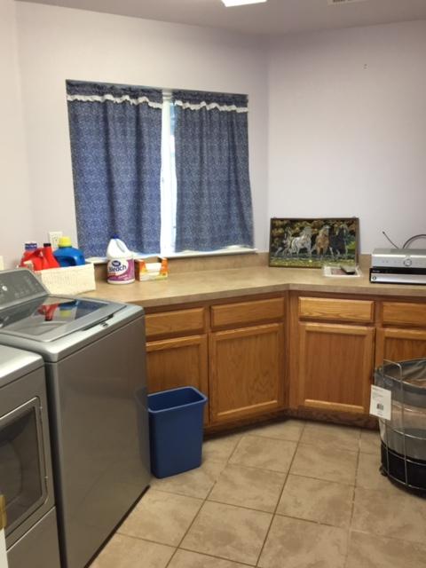 21215 Gyle Road Corning, CA 96021 - Photo 33 of 75 a utility room with a washer and dryer