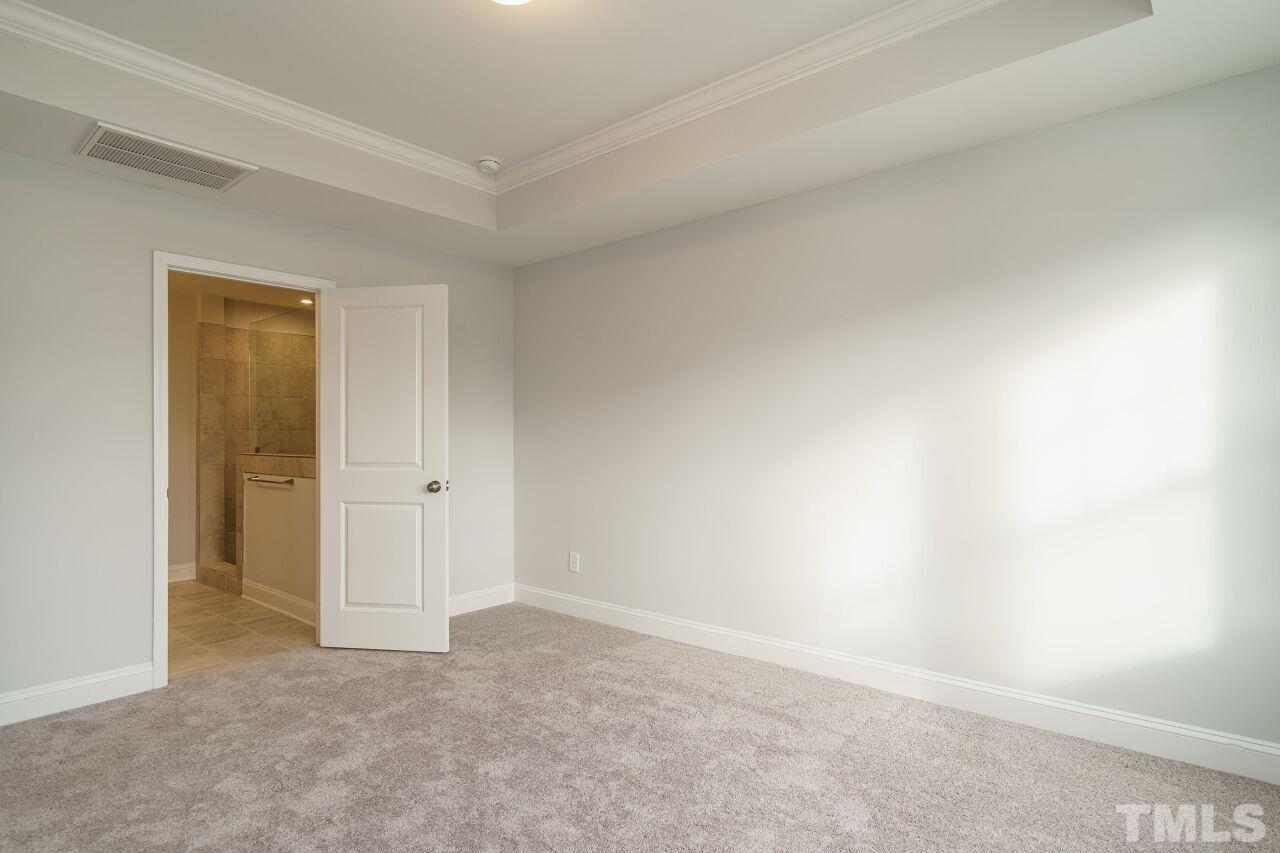 3113 Dunnock Drive, Unit 3 Durham, NC 27713 - Photo 21 of 30 a view of an empty room and closet area