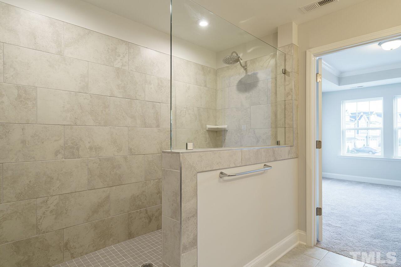 3113 Dunnock Drive, Unit 3 Durham, NC 27713 - Photo 23 of 30 a bathroom with a shower