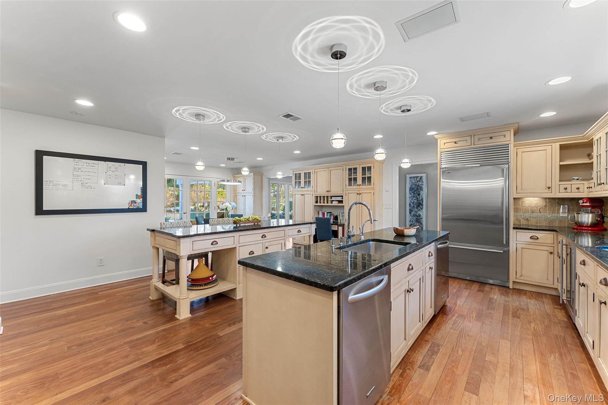 110 Round Hill Road Scarsdale, NY 10583 - Photo 14 of 48 View of kitchen with 2 dishwashers and fleet of upscale stainless steel appliances