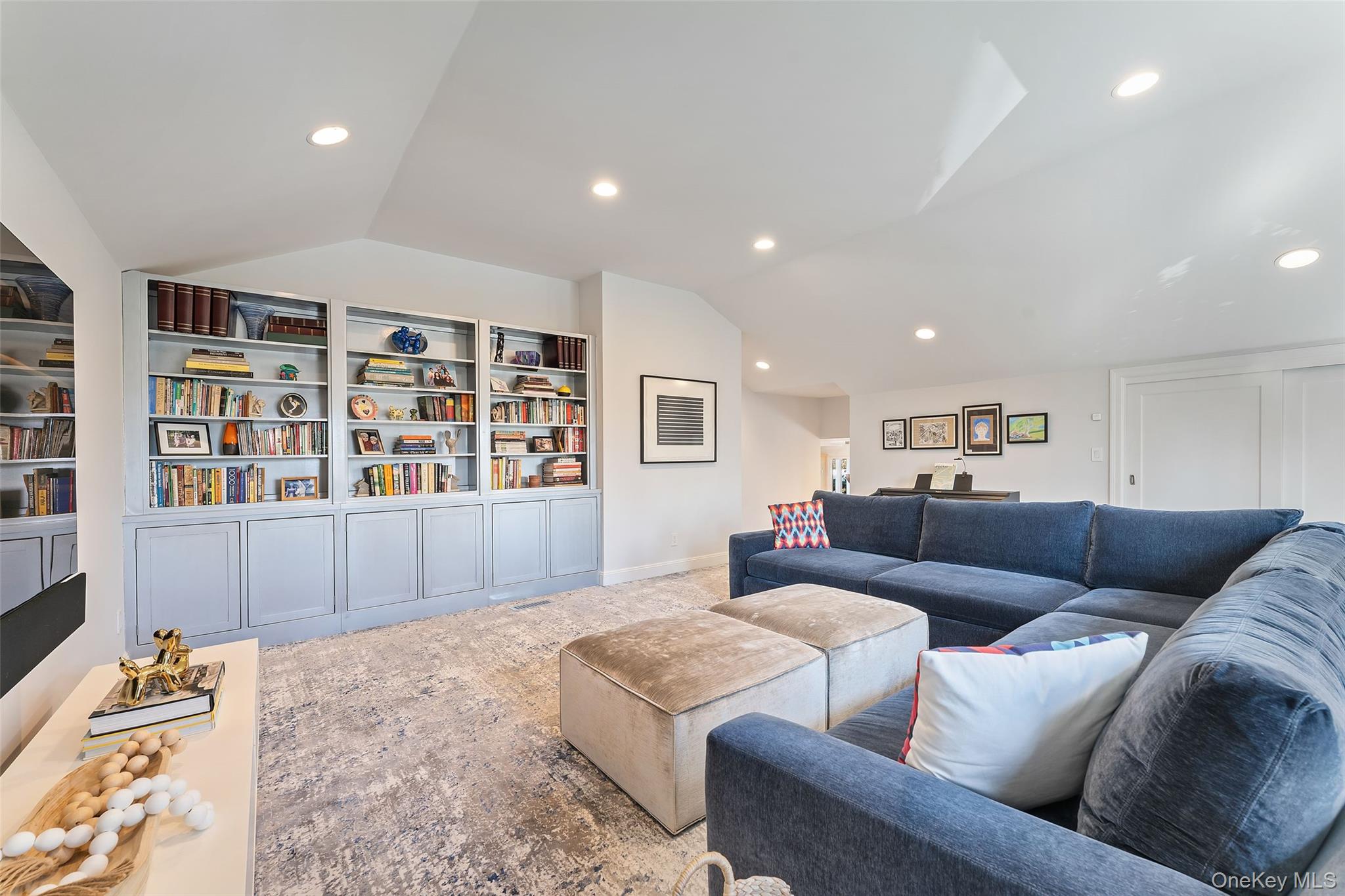 110 Round Hill Road Scarsdale, NY 10583 - Photo 21 of 48 Family room with custom built in shelving