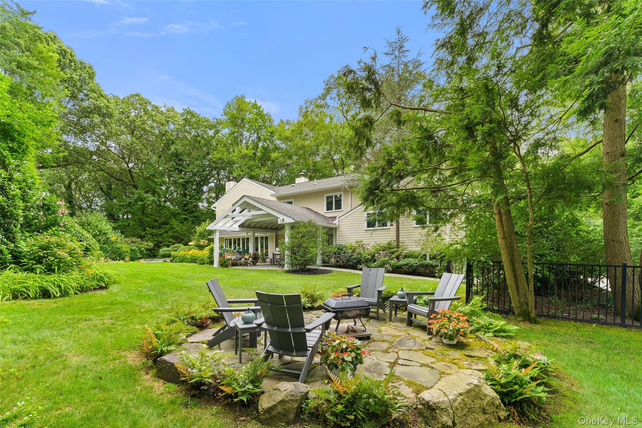 110 Round Hill Road Scarsdale, NY 10583 - Photo 36 of 48 View from outdoor fire pit patio