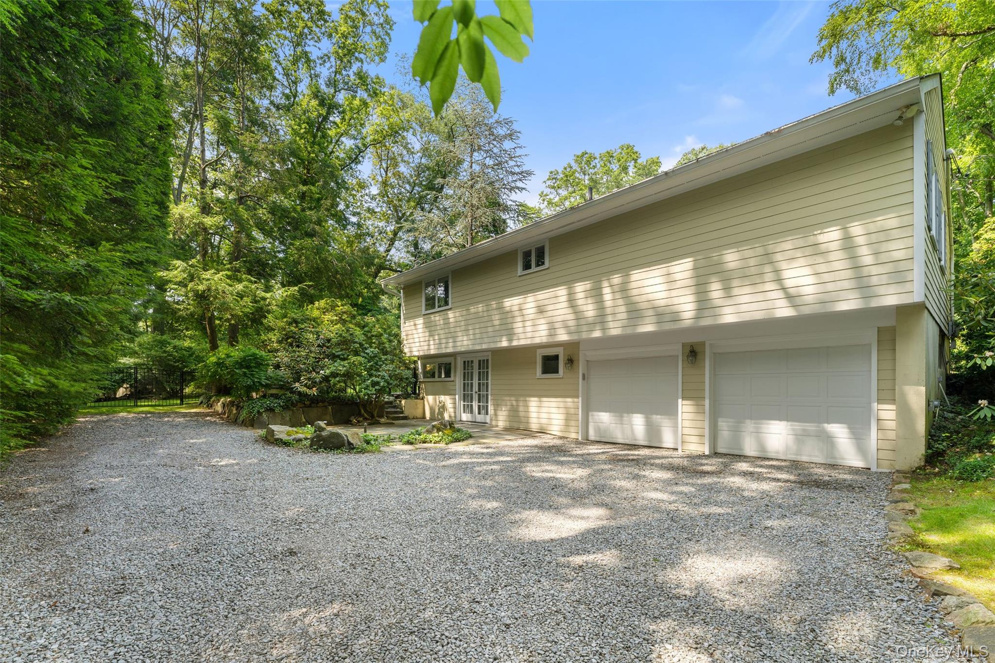 110 Round Hill Road Scarsdale, NY 10583 - Photo 39 of 48 2 car garage with extra wide driveway