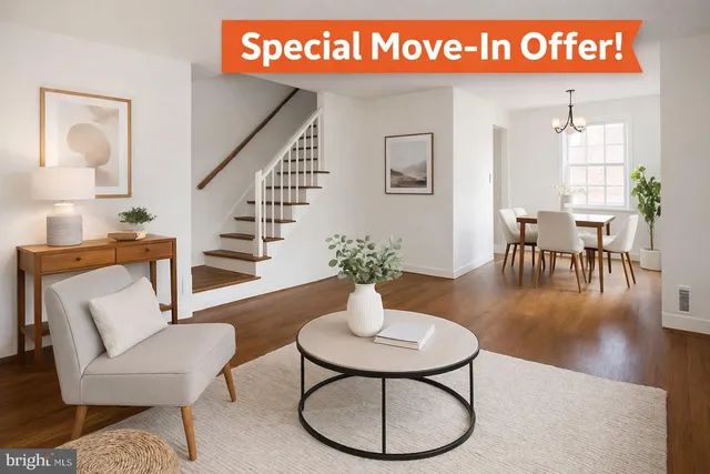 a view of a livingroom with furniture and wooden floor