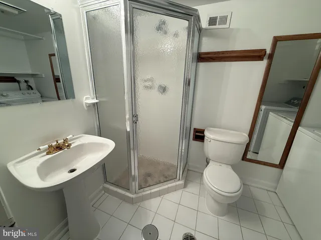 a workspace with furniture and a window