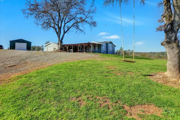 a view of a porch with a backyard