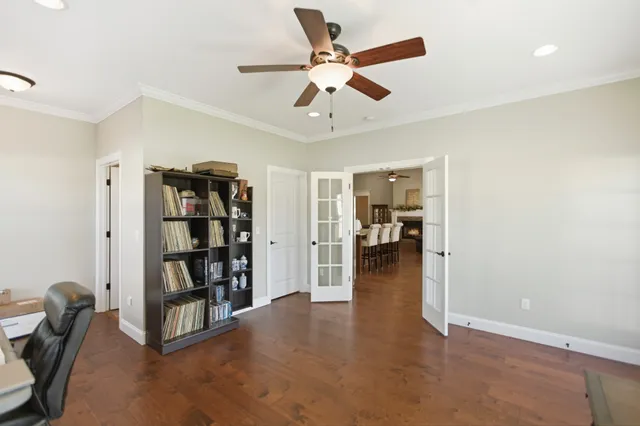 a bathroom with a sink a mirror and toilet