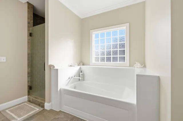 a view of hallway with wooden floor