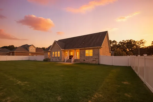 a view of house with garden