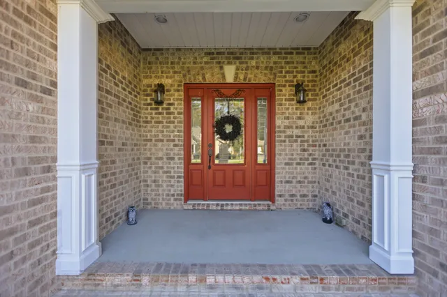a front view of a house with a outdoor space