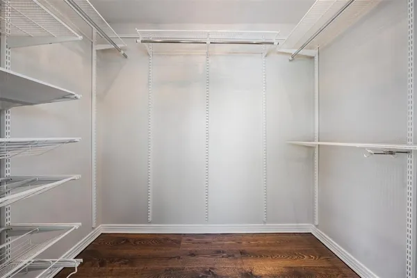 a view of a room with racks on the wall