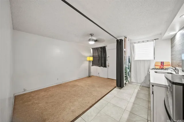 a view of a kitchen with a sink