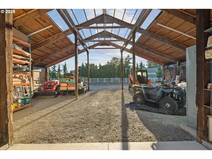 a view of a swimming pool with an outdoor seating