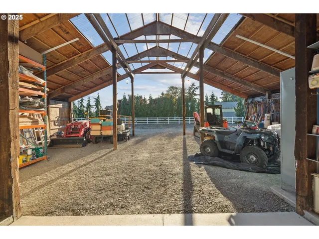 a view of a swimming pool with an outdoor seating