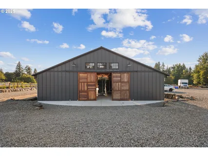 a view of a town with big trees