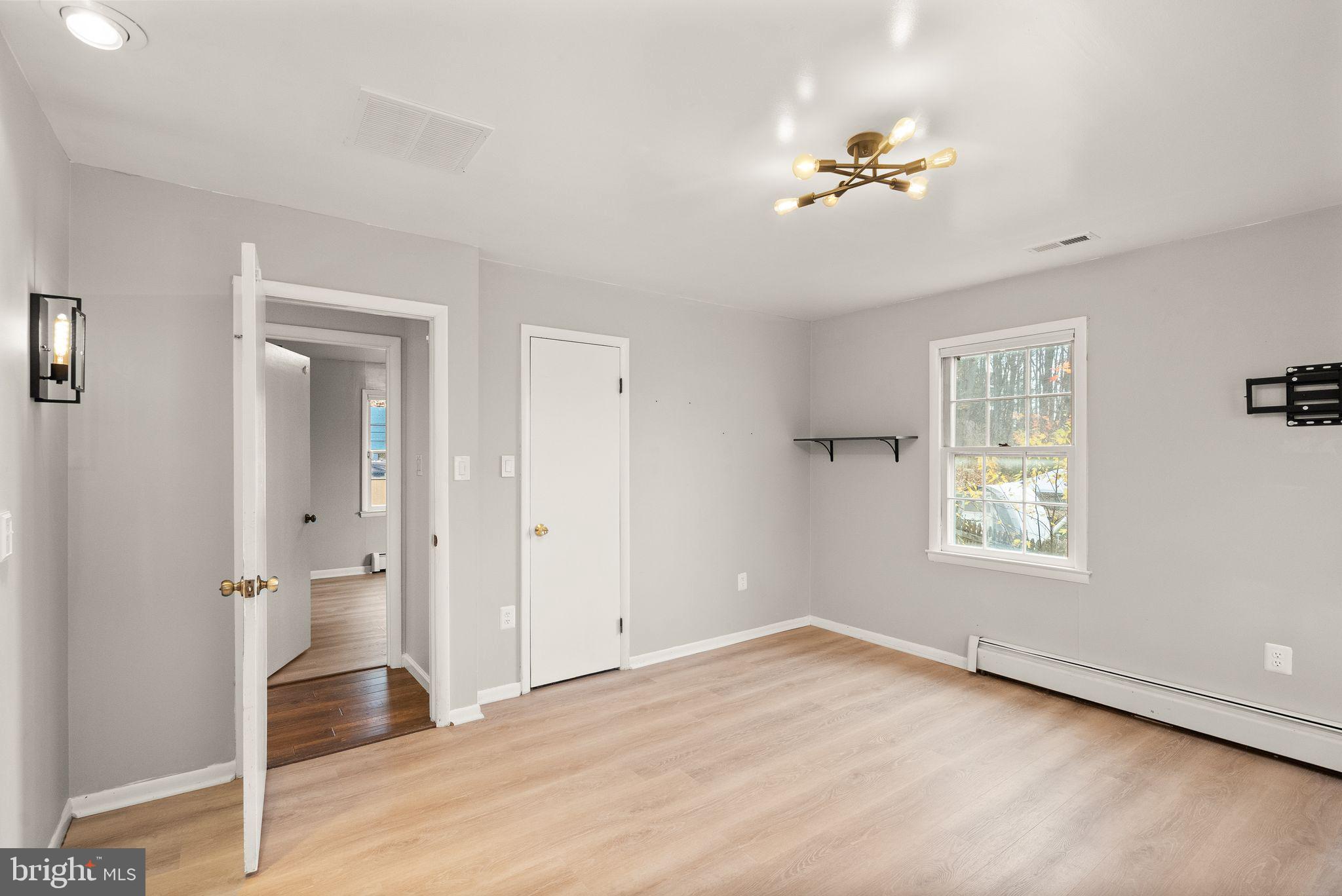 6738 Kelly Road Warrenton, VA 20187 - Photo 16 of 55 a view of an empty room with a window