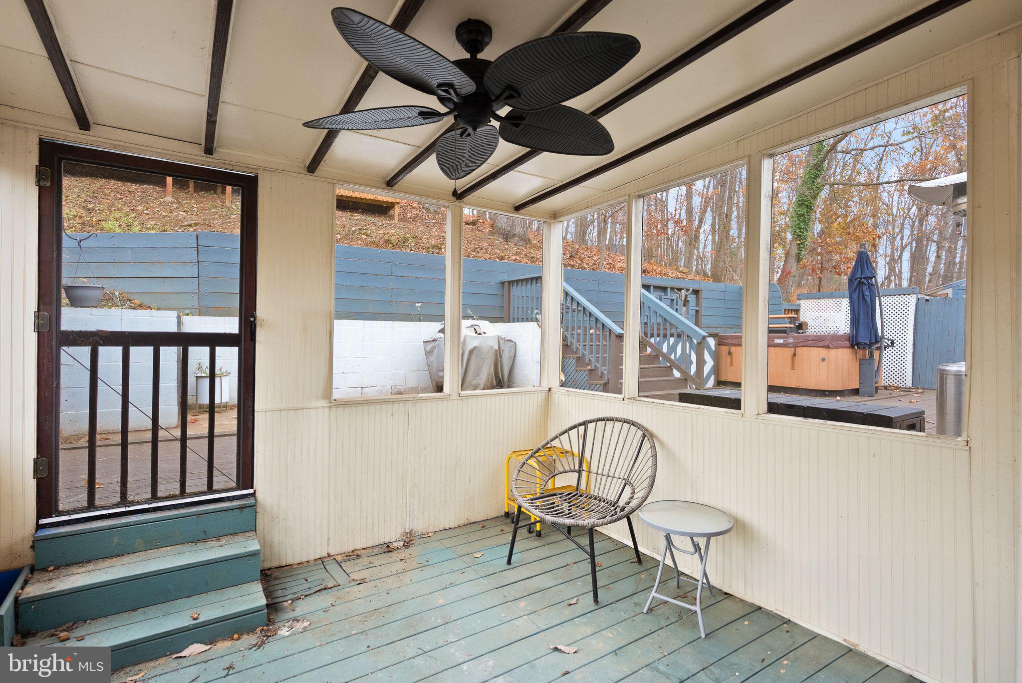 6738 Kelly Road Warrenton, VA 20187 - Photo 34 of 55 a view of a room with furniture wooden floor and windows