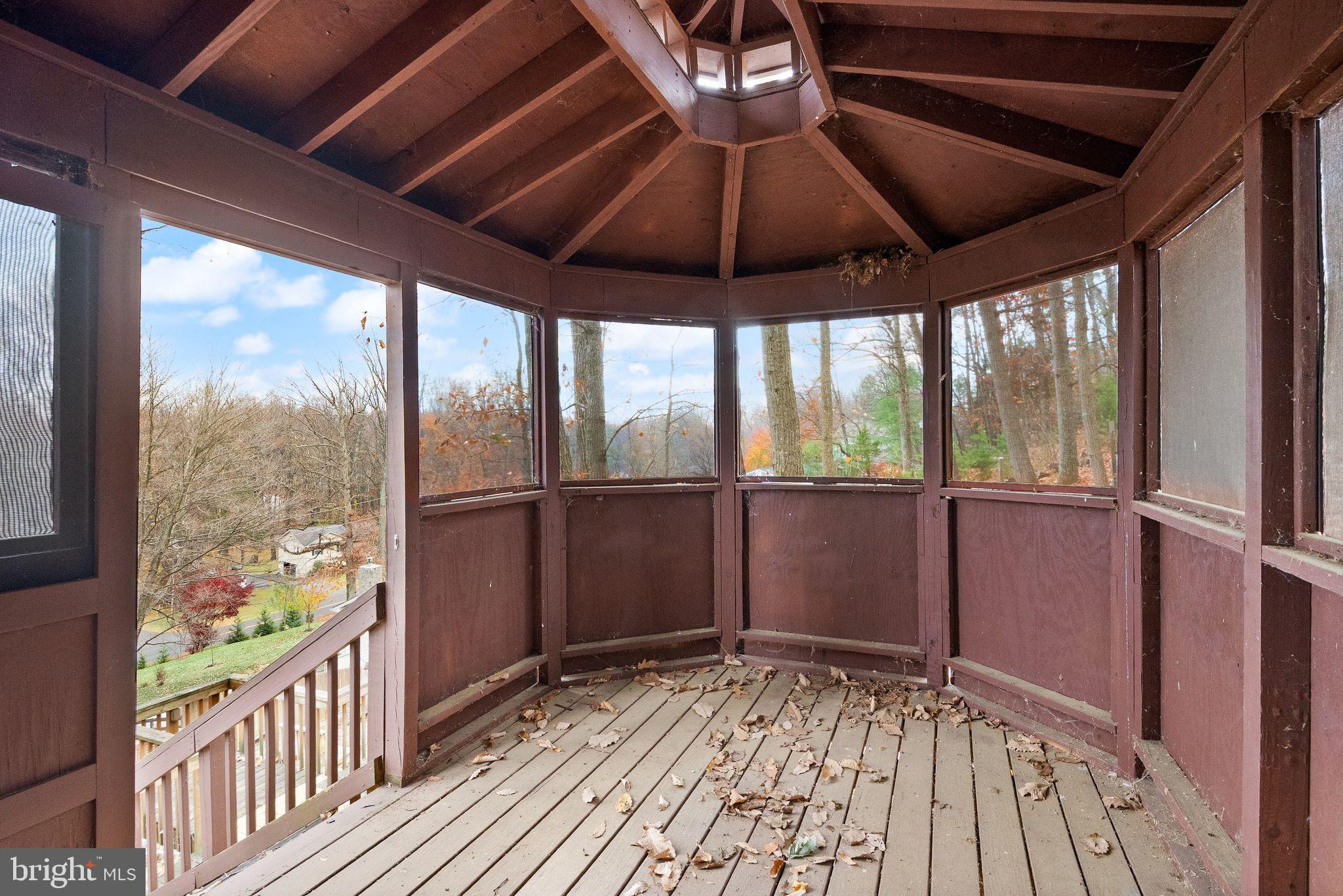 6738 Kelly Road Warrenton, VA 20187 - Photo 50 of 55 a view of an empty room with a window and wooden floor