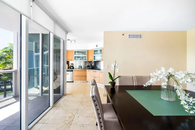 a bedroom with a bed and a lamp