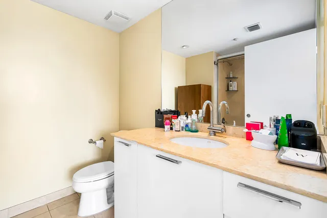 a front view of a building with garden