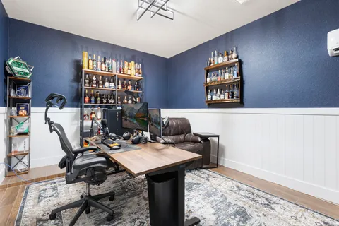 a view of a workspace with furniture