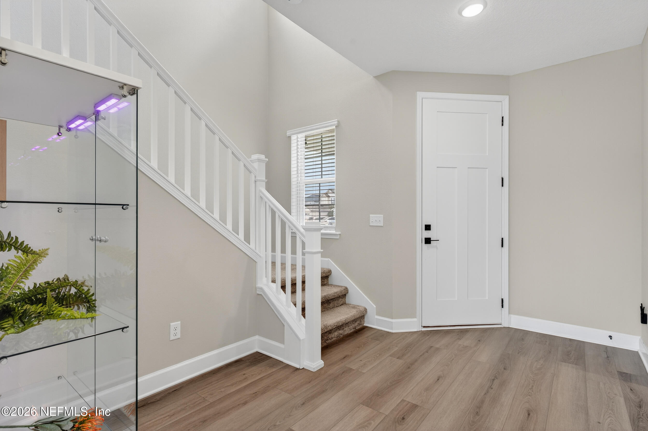 57 Cedar Elm Way St. Augustine, FL 32092 - Photo 7 of 65 a view of an entryway with wooden floor