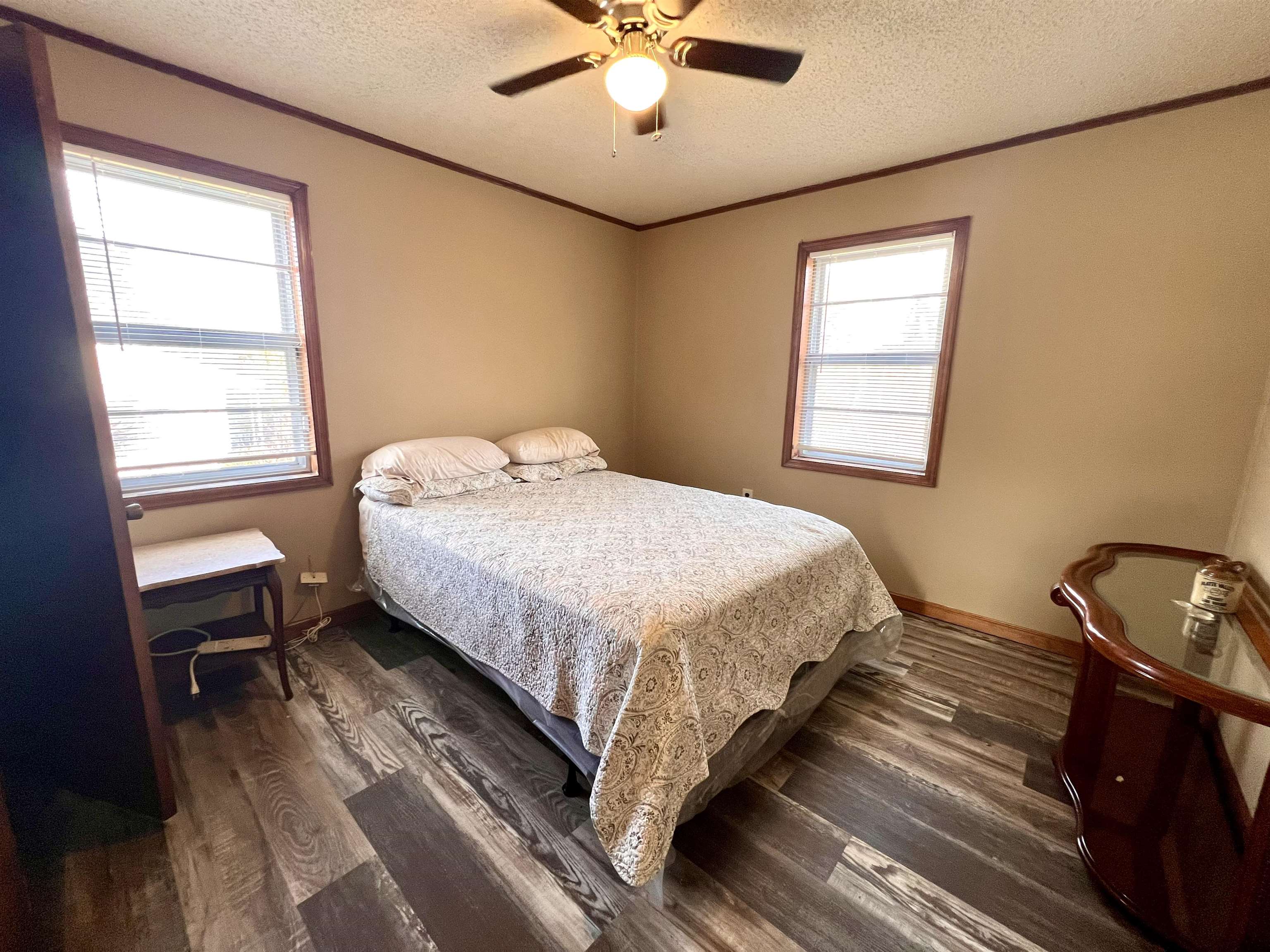 597 Walton Loop Covington, TN 38019 - Photo 15 of 16 a bedroom with a bed and a window