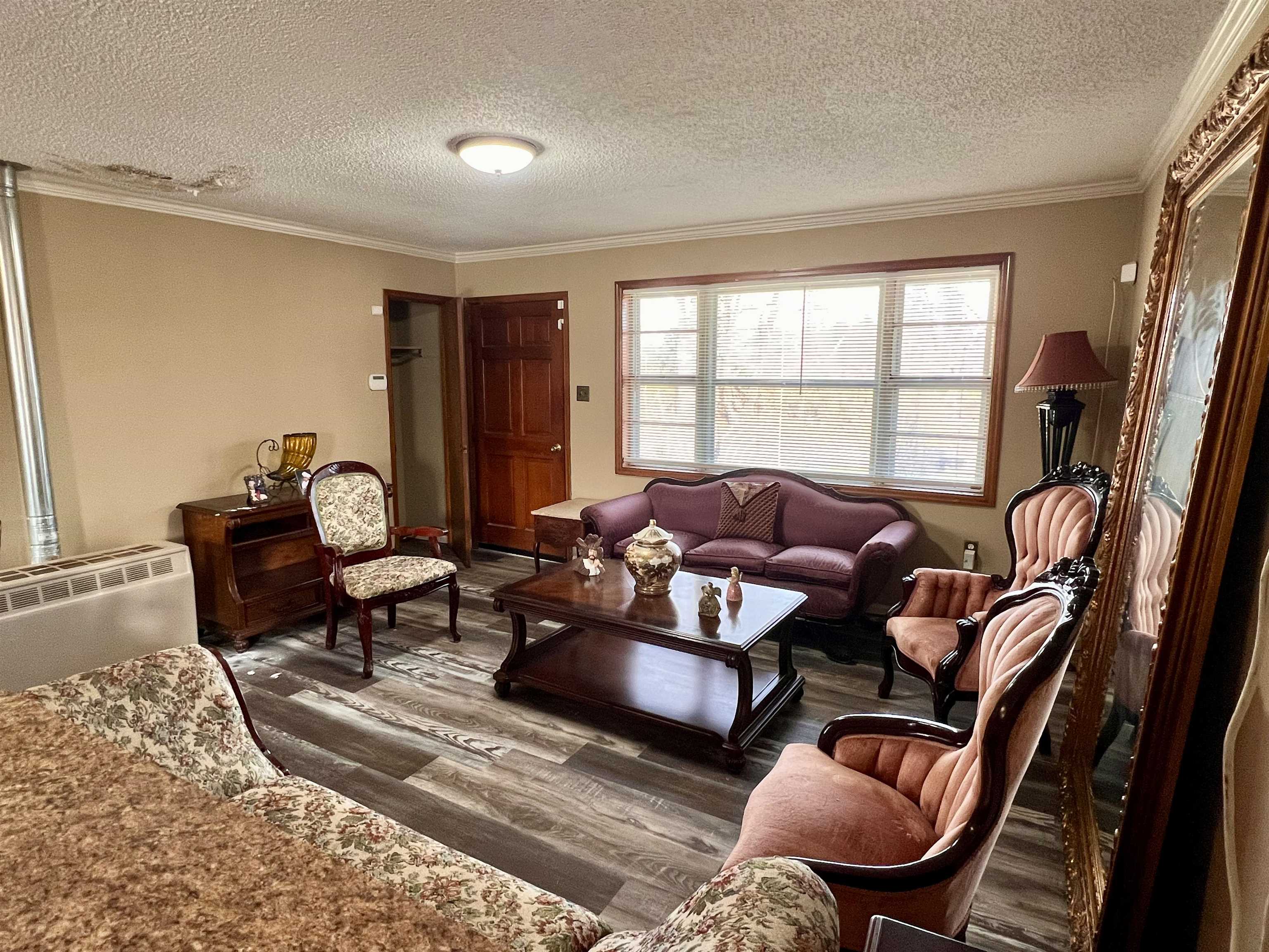 597 Walton Loop Covington, TN 38019 - Photo 5 of 16 a living room with furniture and a window