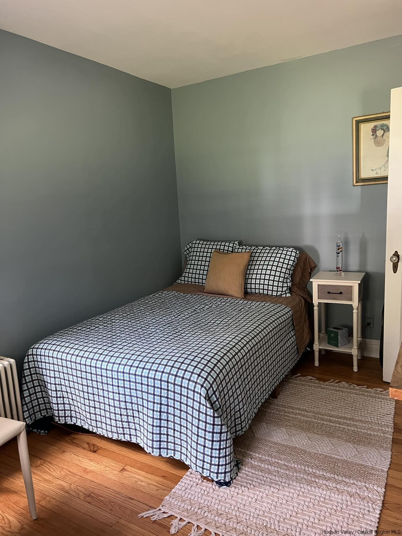 3615 Atwood Road Stone Ridge, NY 12484 - Photo 16 of 22 a bedroom with a bed and a desk