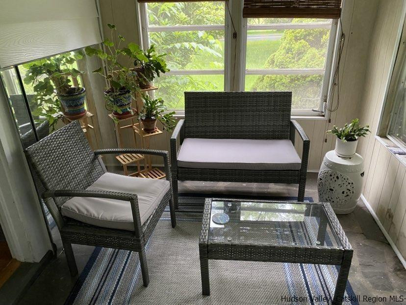 3615 Atwood Road Stone Ridge, NY 12484 - Photo 17 of 22 a outdoor sitting area with furniture and a window