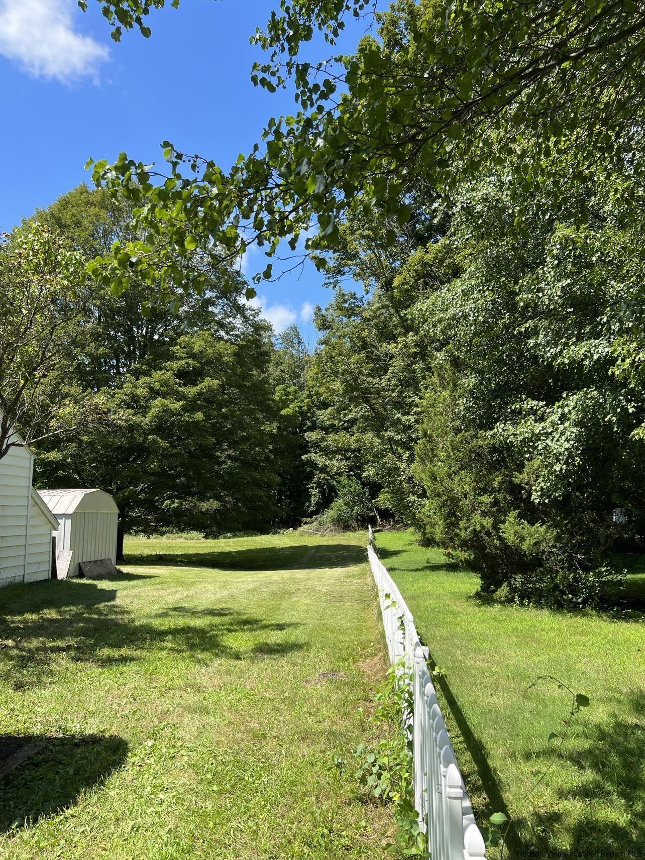 3615 Atwood Road Stone Ridge, NY 12484 - Photo 4 of 22 a view of a swimming pool with a yard