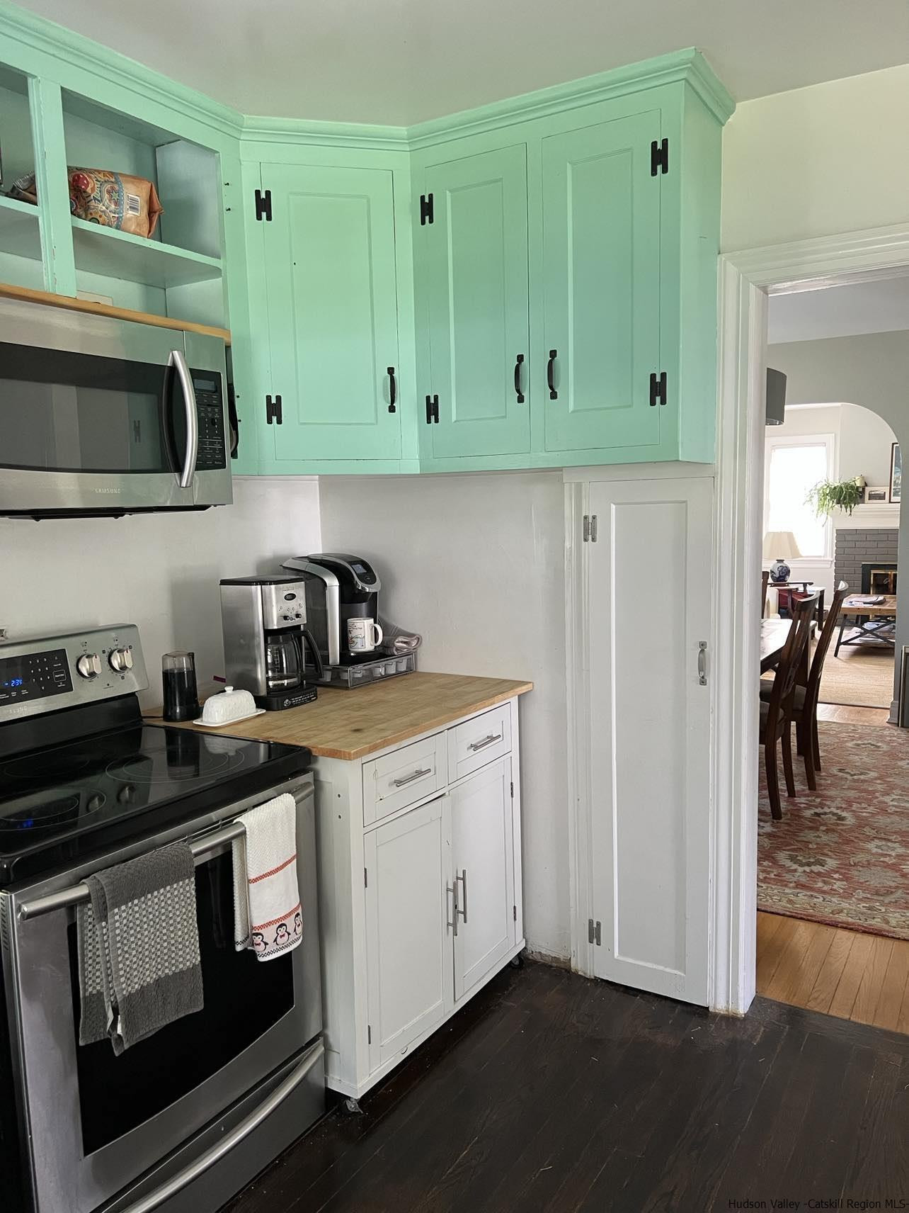3615 Atwood Road Stone Ridge, NY 12484 - Photo 10 of 22 a kitchen with stainless steel appliances granite countertop a stove and a microwave