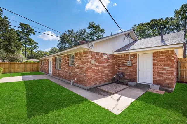 a view of a backyard with a garden